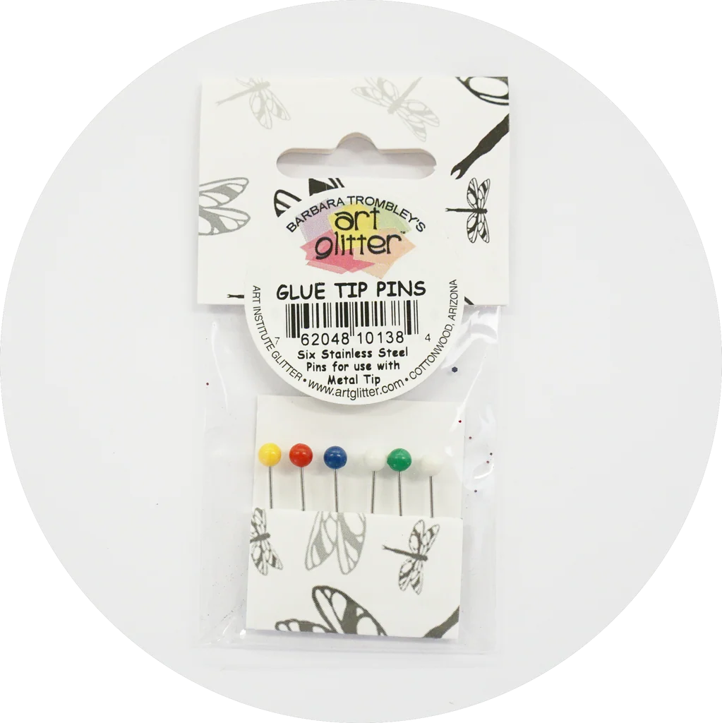 Pack of glue tip pins with colorful tips on a white background