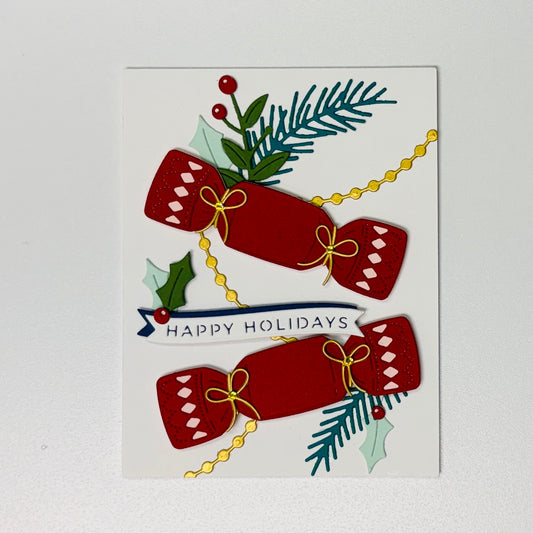 Christmas cracker card with holly and 'Happy Holidays' text on a white background