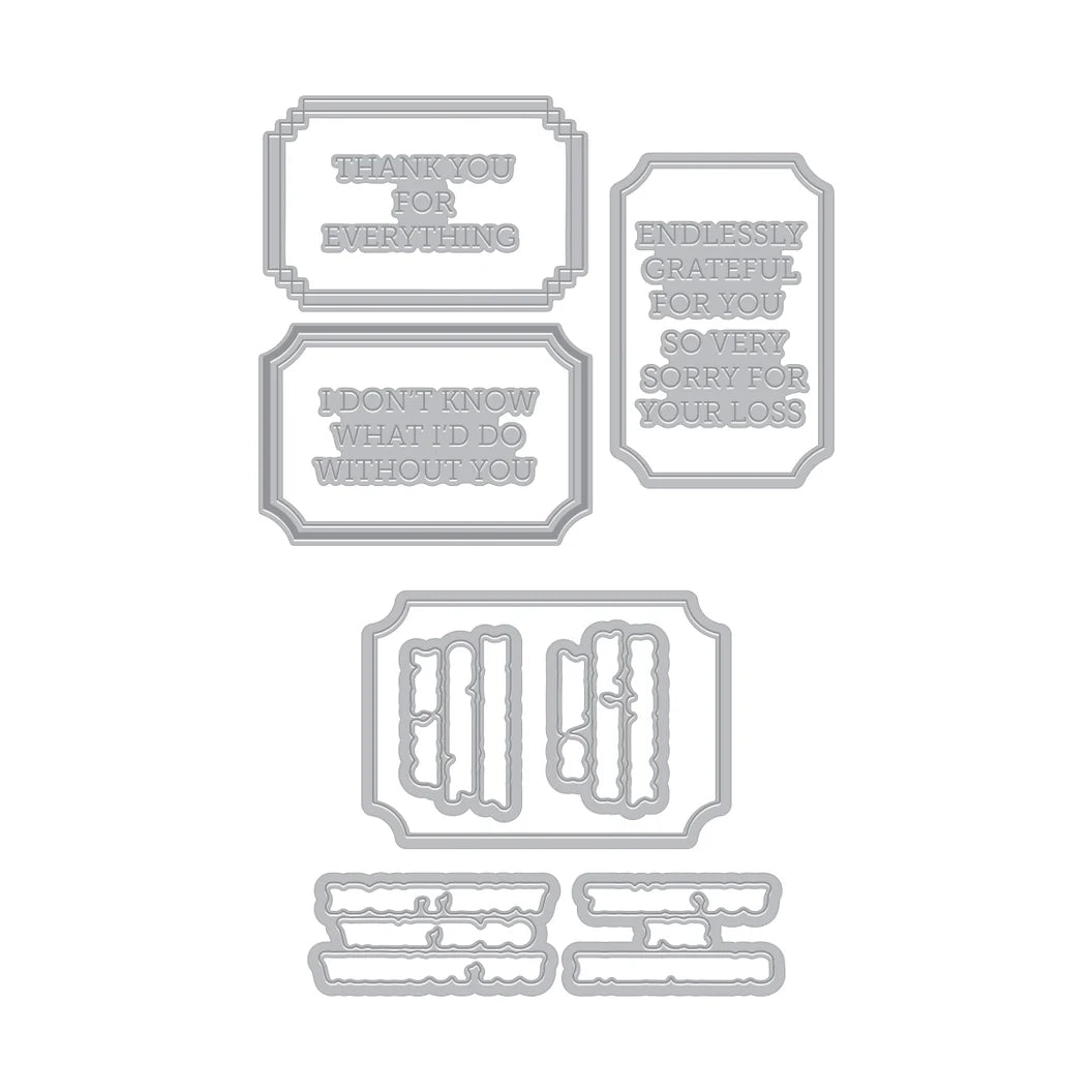 Set of metal die cut shapes with engraved text on a white background
