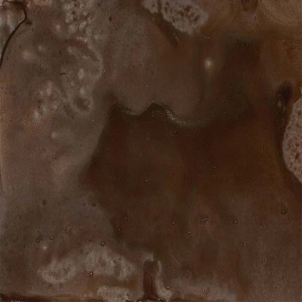 Close-up of a textured shimmer brown surface with a focus on color and pattern.