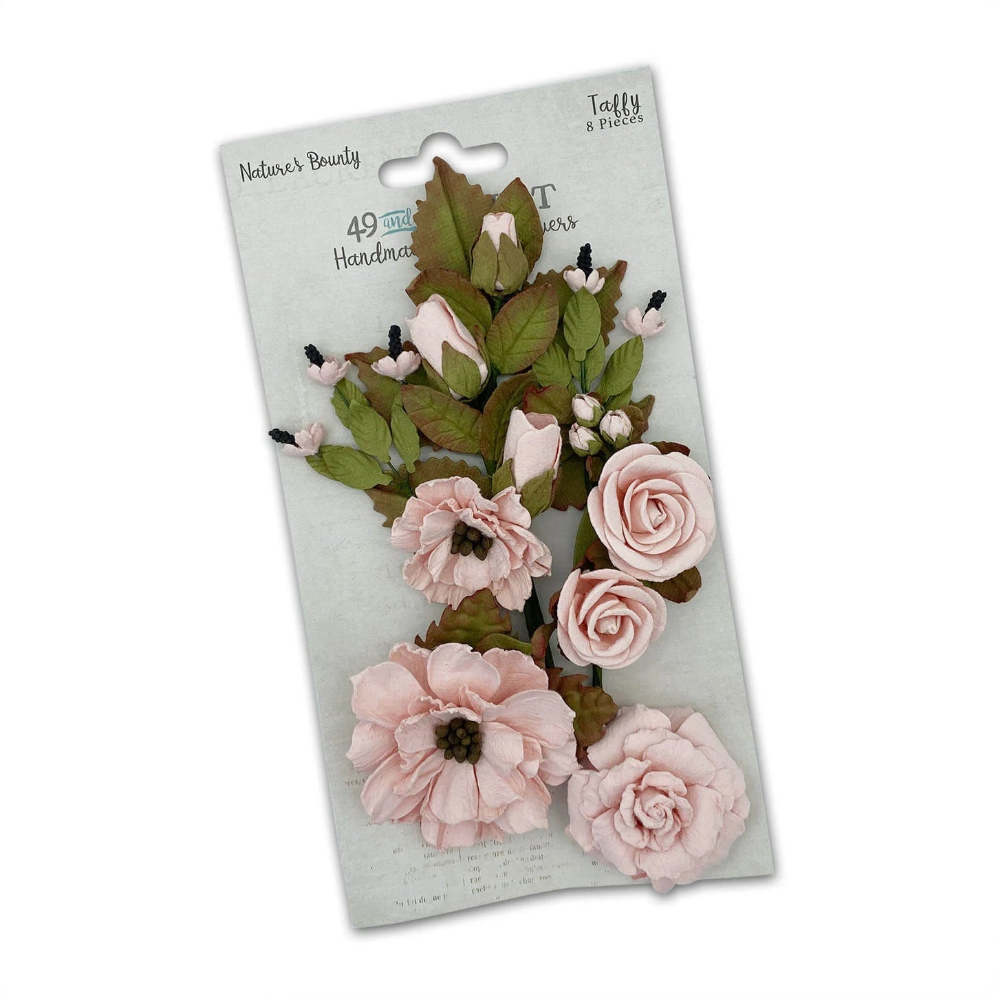 A package of 49-piece Nature's Beauty Taffy fabric flowers, featuring light pink roses, peonies, and buds with green and brown leaves, displayed on a white backing card.