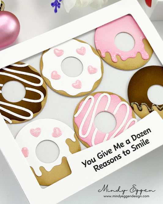 card sample of donuts in a box, pink and chocolate frosted paper donuts