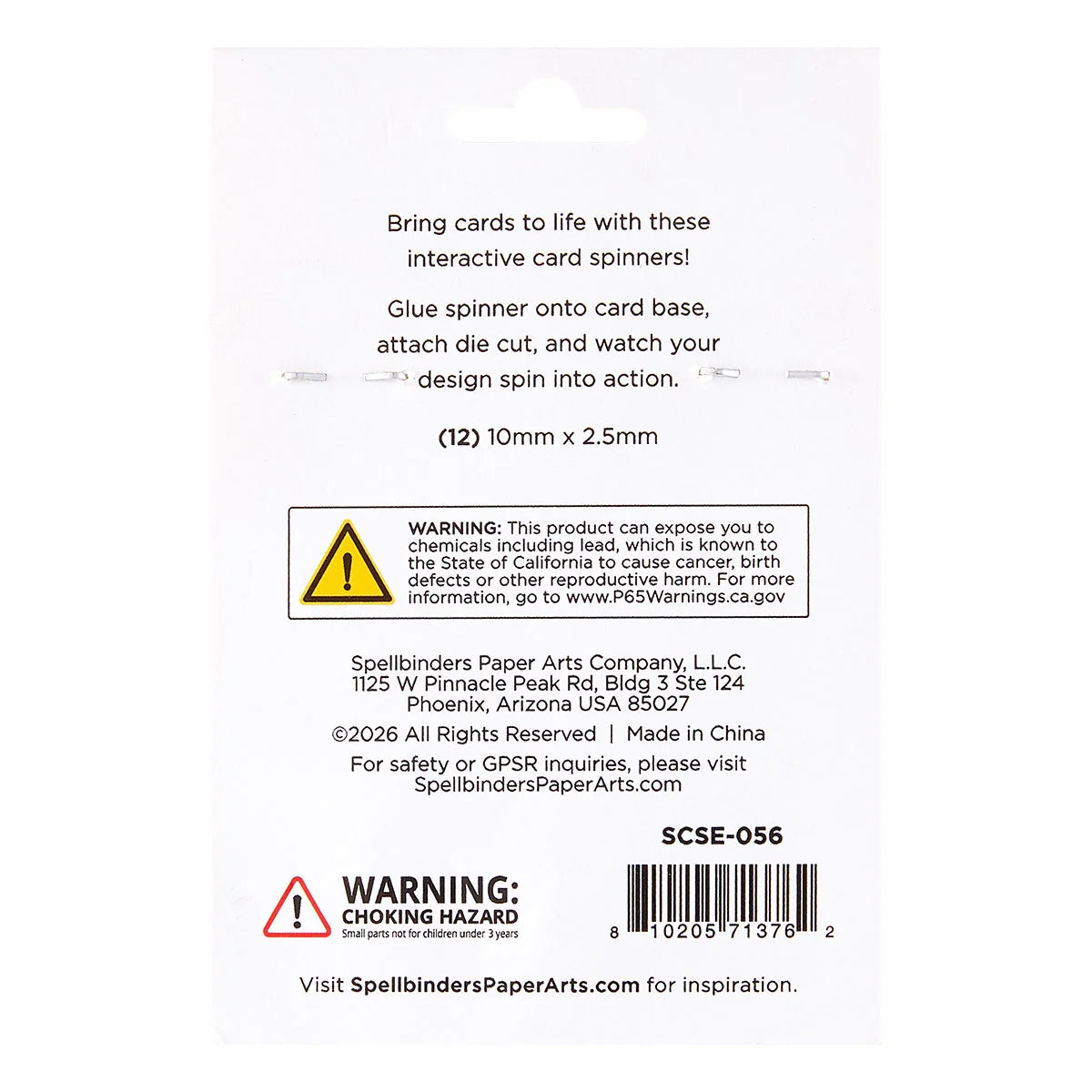 Back of a Spellbinders Paper Arts interactive card spinner package, showing product instructions, a yellow warning label, product code SCSE-056, and a barcode on a white background.