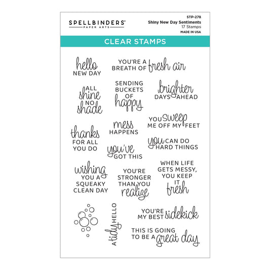 Set of clear stamps with various motivational phrases on a white background, branded 'Spellbinders'.