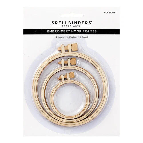 Spellbinders Paper Arts Embroidery Hoop Frames set in its original retail blister packaging, containing three natural wood hoop frames of different sizes.
