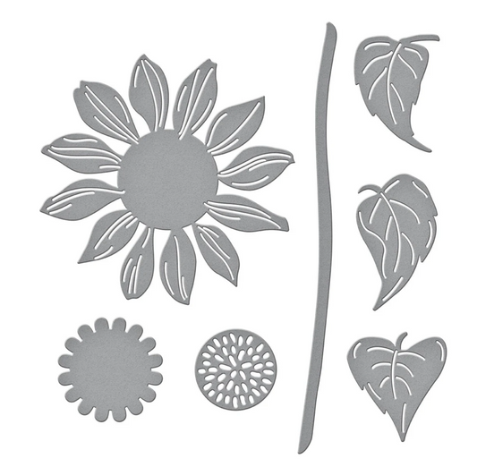 Set of metal flower and leaf cutouts on a white background