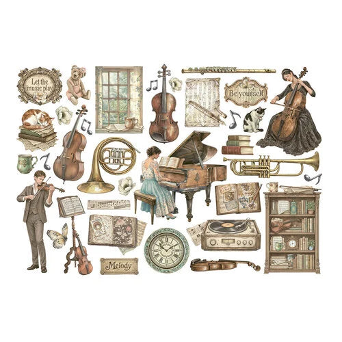 Stamperia die cuts horns, string instruments, clock, window scattered on a white background