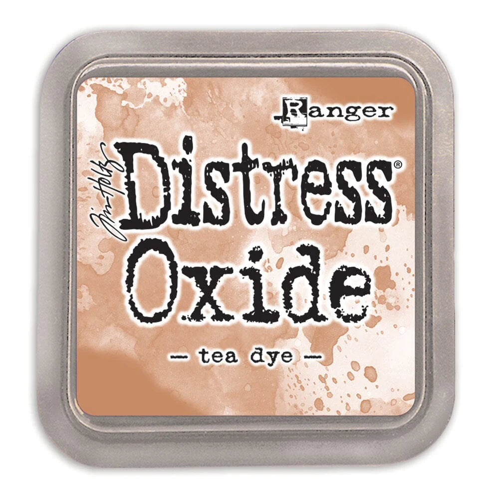Ranger Distress Oxide ink pad with 'tea dye' color on a white background