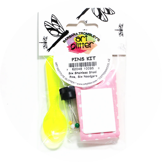 Barbara Trombley Art Glitter pins kit with a yellow tool and pink packaging on a white background