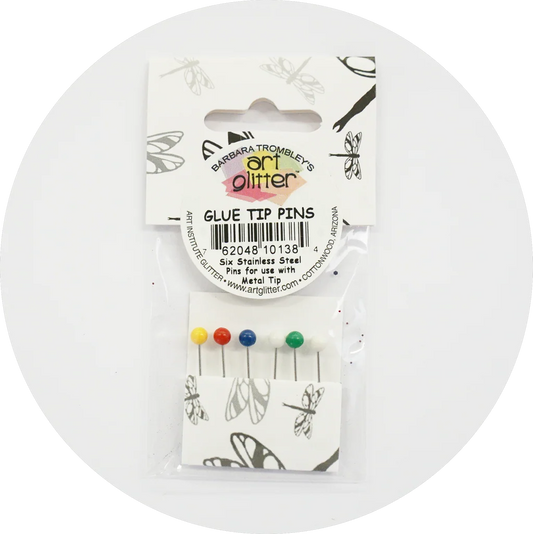 Pack of glue tip pins with colorful tips on a white background
