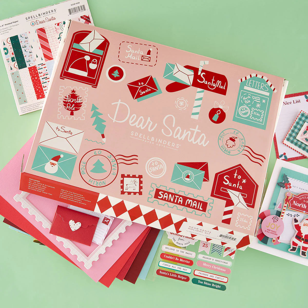 Spellbinders dear santa box surrounded with paper pad and embellishments
