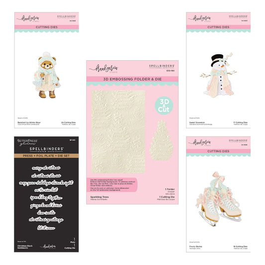 Spellbinders crafting dies and embossing folder set displayed on a white background, including a teddy bear, snowman, snow boots, and lettering dies with pink and teal packaging.