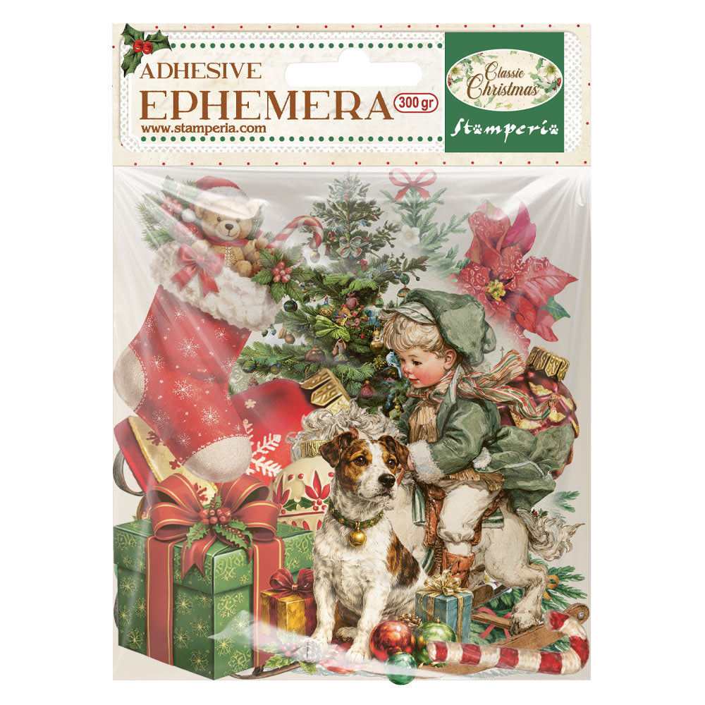 Packaging of Stamperia adhesive ephemera with Christmas design featuring Santa Claus, child, and dog.