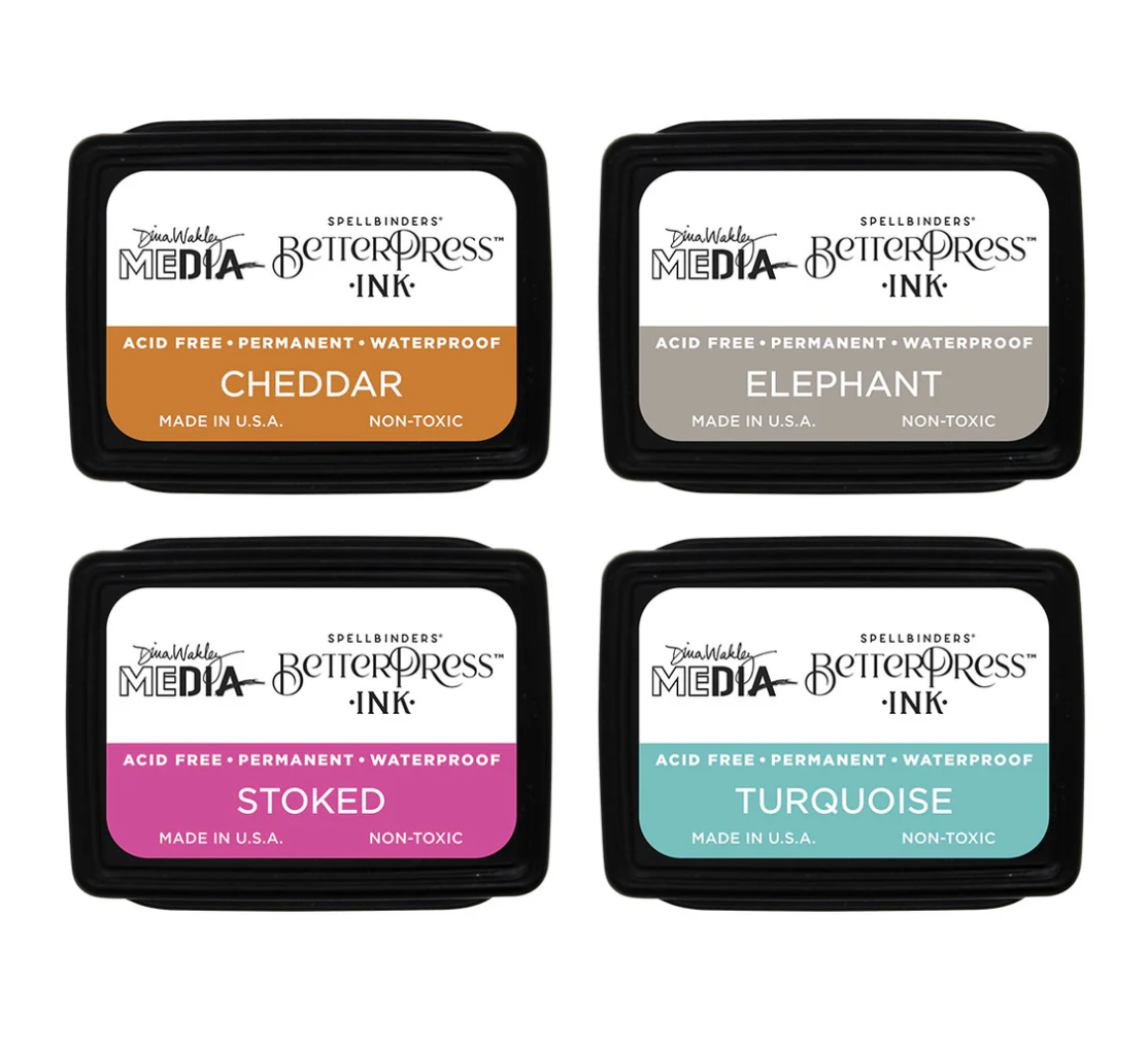 Four ink pads with different colors and labels on a white background