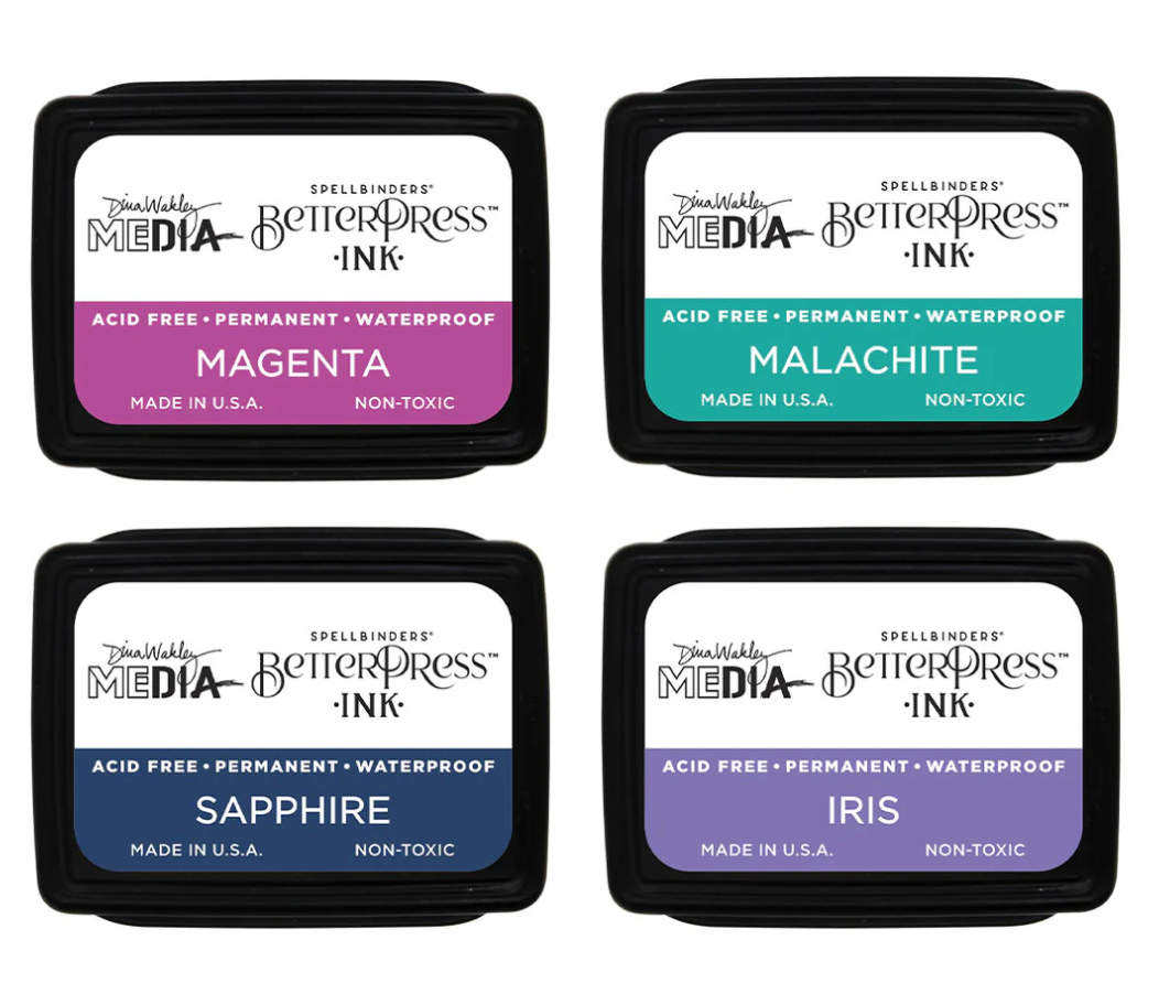 Four ink pads with different colors and labels on a white background