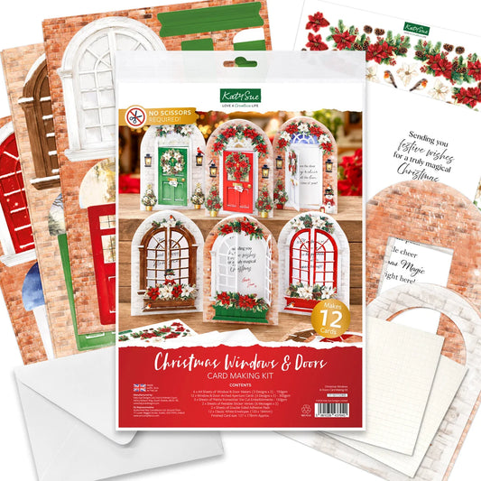 Katy Sue Christmas Windows & Doors Card Making Kit, showing the main retail package in the center with several sample cards and envelopes fanned out around it. The kit includes decorated arched window and door card designs, brick-pattern backing cards, and white envelopes.