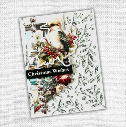 Christmas card with a bird and foliage design on a textured white background