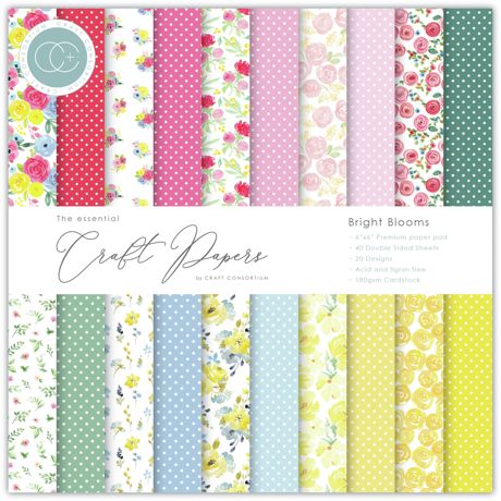 Collection of floral and polka dot patterned papers with 'Craft Consortium' branding.