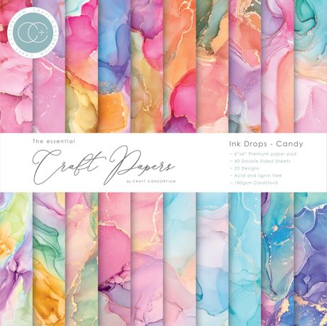Collection of colorful craft papers with ink drop designs on a white background.