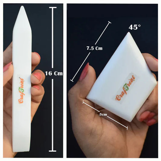 White teflon bonefolder with 'Craftreet' branding held by a hand, showing dimensions on a black background.