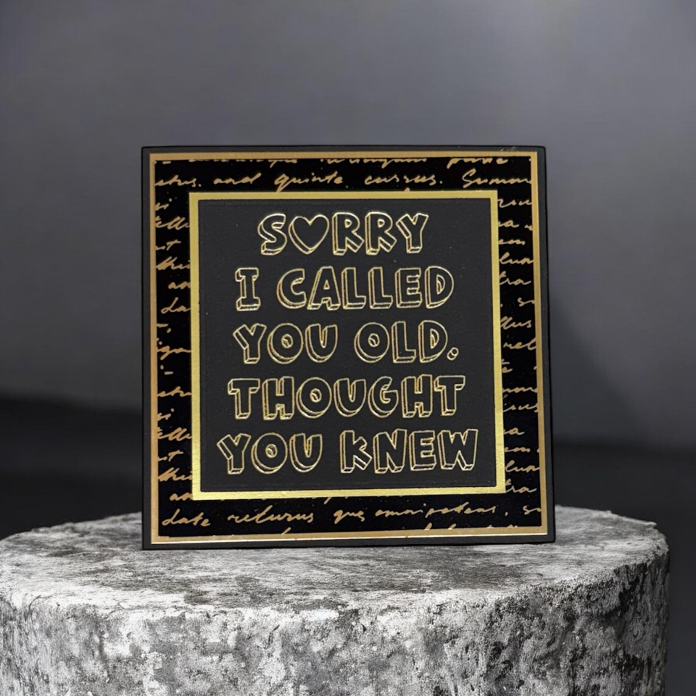 Load video: Handmade foil on foil card with gold sentiment on black cardstock reading Sorry I Called You Old Thought You Knew, made at Crafts on the Move Aquebogue NY