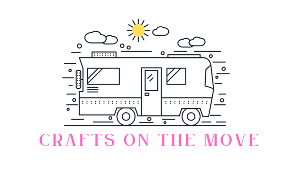 A minimalist line-art illustration of an RV with clouds, sun, and motion lines, above the pink text 'CRAFTS ON THE MOVE' on a white background.