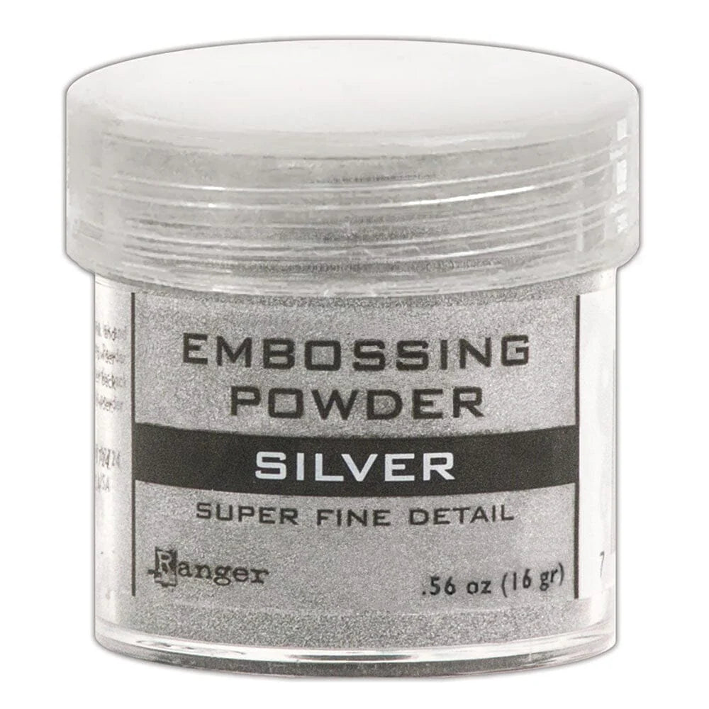 Jar of silver embossing powder on a white background