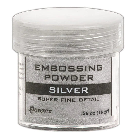 Jar of silver embossing powder on a white background