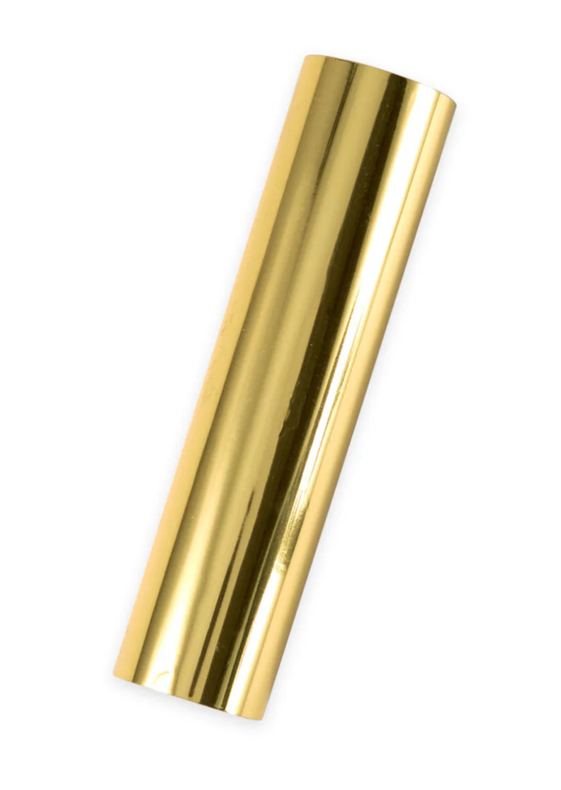 A single roll of gold colored glimmer hot foil with a metallic finish.