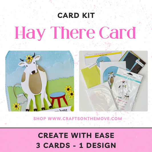 Card kit with cow illustration and crafting materials on a white background