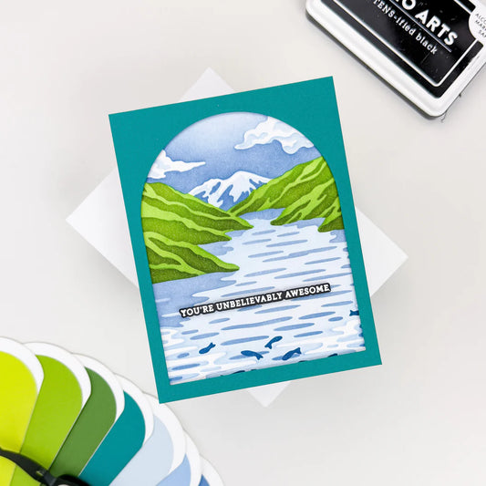 Hero Arts Greeting card with mountain and lake illustration and 'You're Unbelievably Awesome' text on a white background.