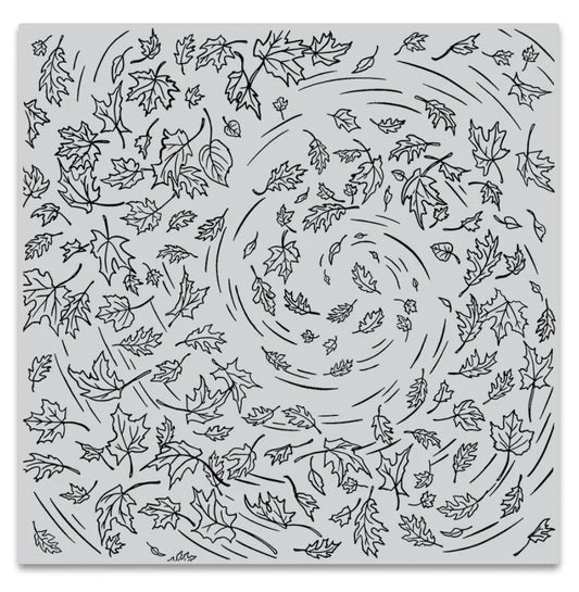 Turning leaf pattern cling stamp on a white background