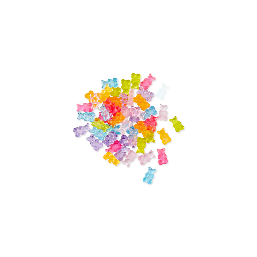 Hero Arts Colorful plastic gummy bear candies scattered on a white background