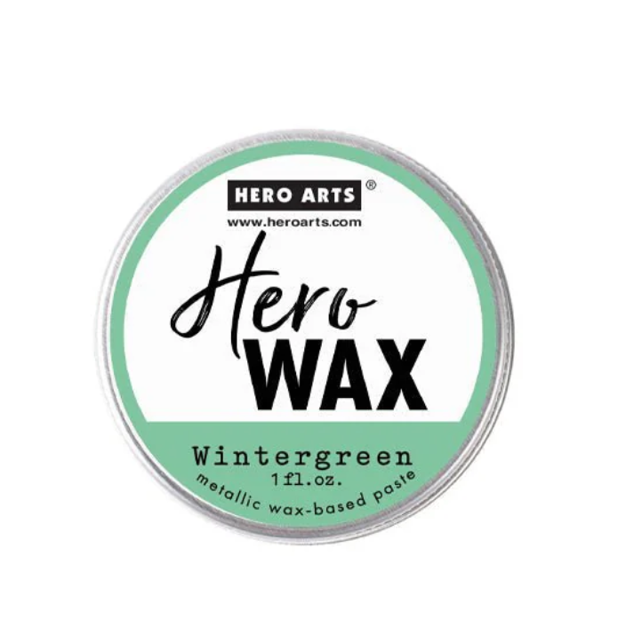 A tin container of Hero Arts Wintergreen wax with a label that includes the brand name and product name.