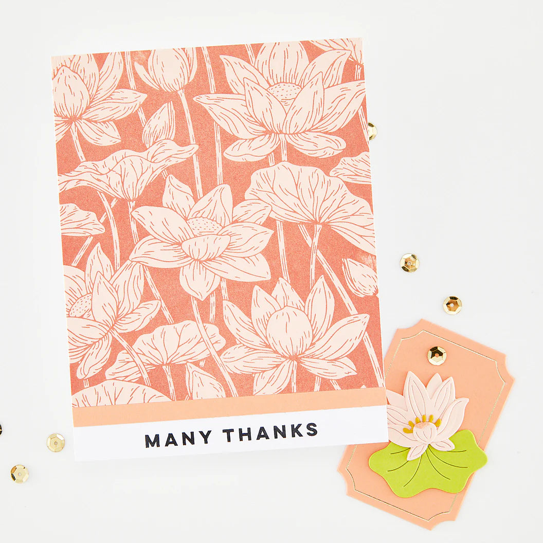 Lotus patterned card with 'Many Thanks' text and decorative flower on a white background