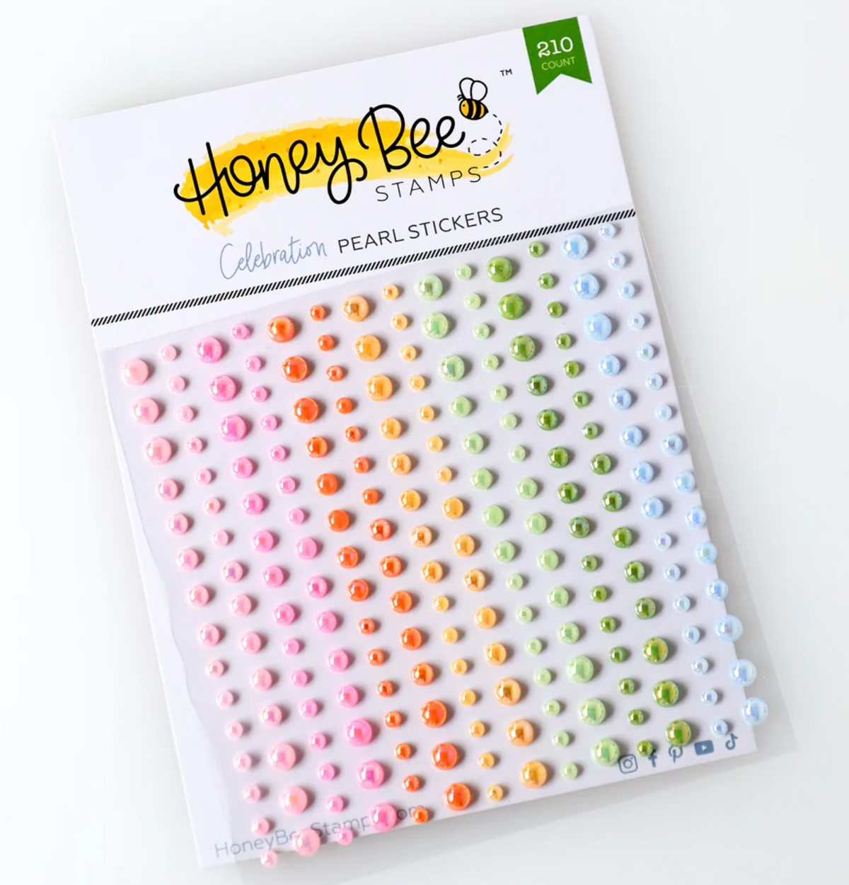 Packaging of Honey Bee Stamps pearl stickers with colorful stickers on a white background