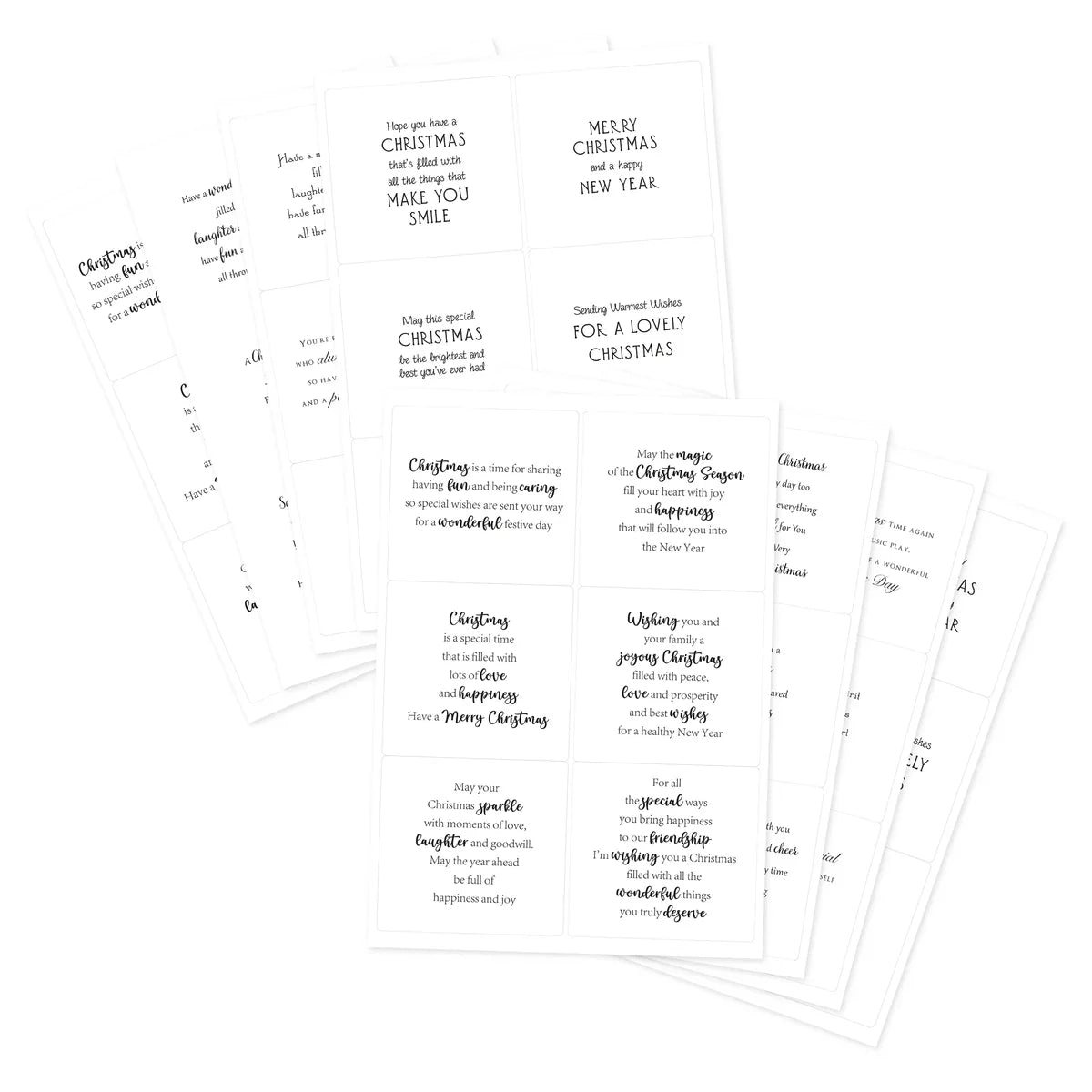A set of printed Christmas-themed clear sticker inserts or cards fanned out on a white background, featuring holiday quotes and text layouts.