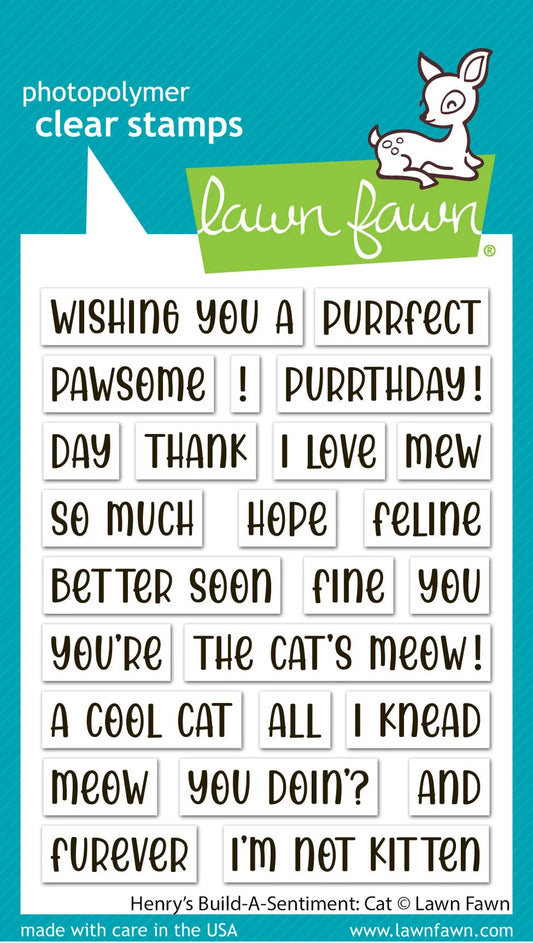 Lawn Fawn photopolymer clear stamps featuring 24 cat-themed phrases on a white sheet, shown against a teal and green Lawn Fawn branded background.