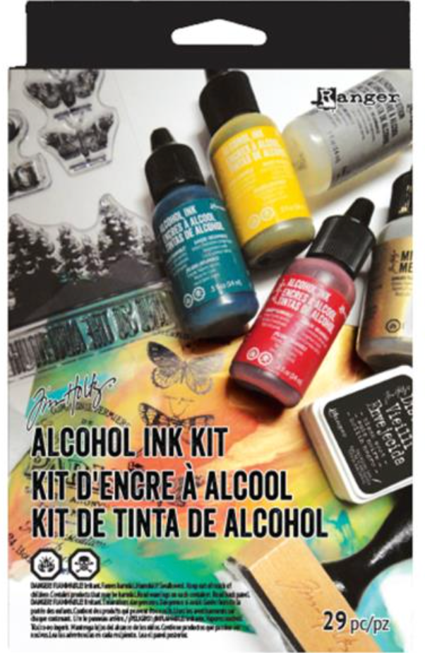 Alcohol ink kit with bottles and stamps on a white background