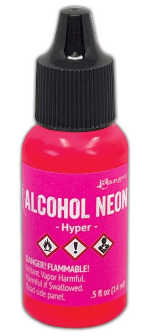 Pink bottle of alcohol neon paint with black cap on a white background