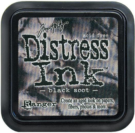 Tim Holtz Distress Ink Pad in black soot color with the brand and product name displayed on the label.