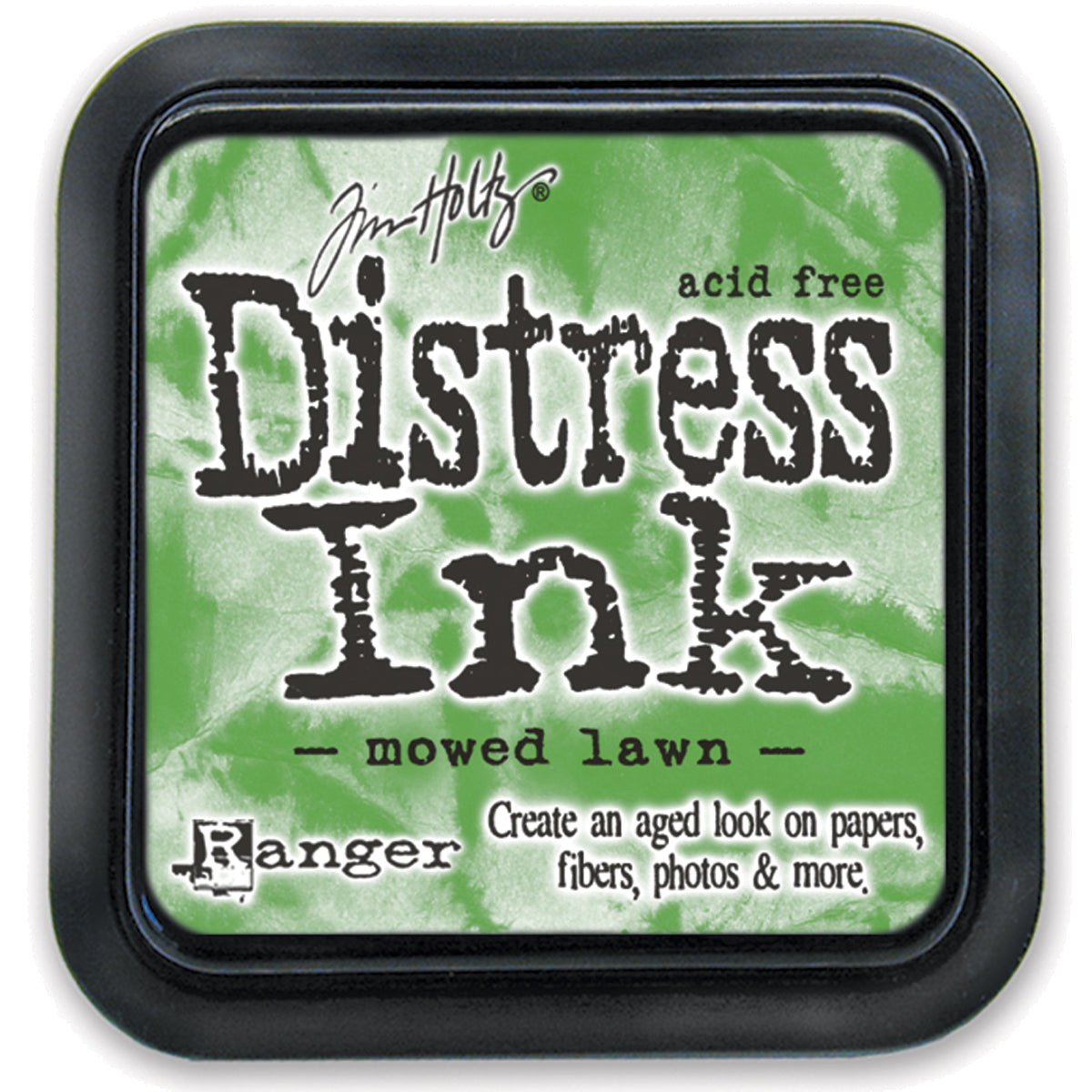 Tim Holtz Distress Ink Pad in mowed lawn color with the brand and product name displayed on the label.