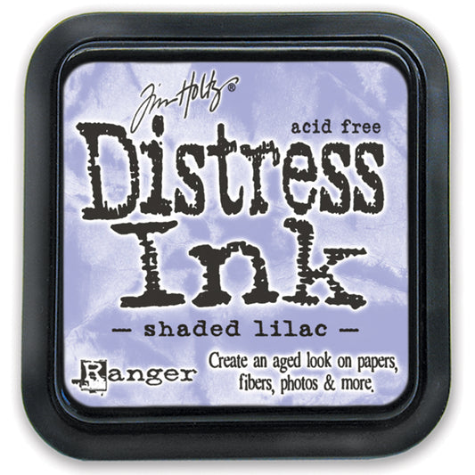 Tim Holtz Distress Ink Pad in shaded lilac color with the brand and product name displayed on the label.
