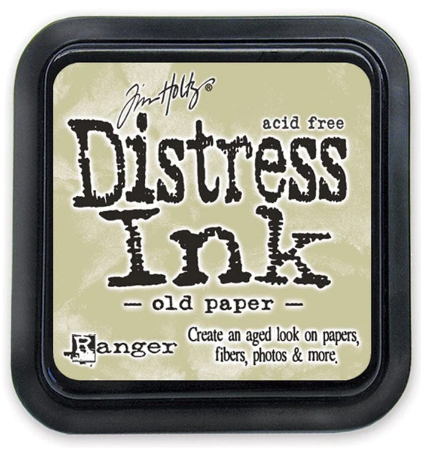 Distress Ink pad by Ranger with 'old paper' color on a beige background