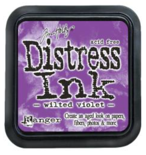 Distress Ink pad by Ranger with 'wilted violet' color on a purple background