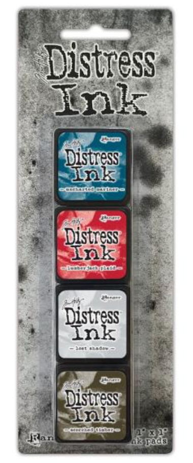 Distress Ink packaging with four ink pads on a textured gray background