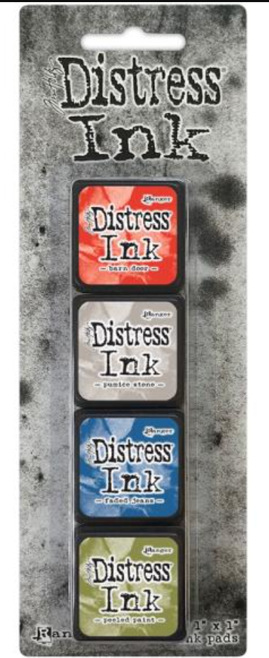 Distress Ink packaging with four ink pads on a textured background