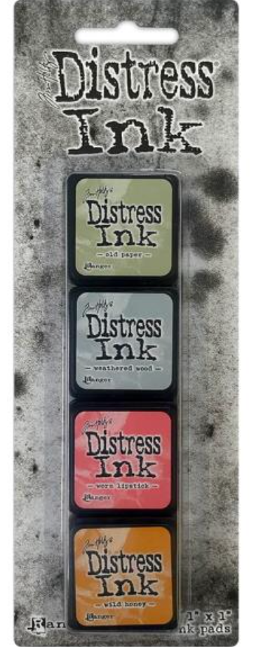 Set of Distress Ink pads in various colors on a packaging card.