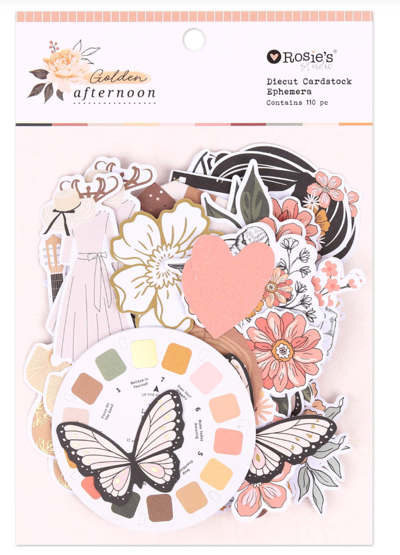 Decorative die-cut cardstock ephemera set with flowers, butterflies, and color swatches on a white background.