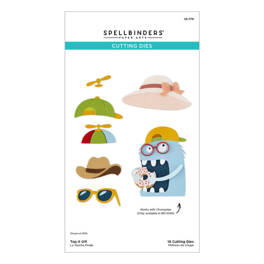 Spellbinders Paper Art 'Top It Off' cutting dies package, featuring colorful illustrated hat and sunglasses designs alongside a blue monster holding a donut, on a white background.
